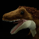 Close-up of Yutyrannus plush head by SoftDaysLab®, highlighting realistic eyes and teeth