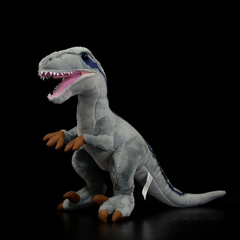Full-body view of SoftDaysLab® Velociraptor plush, featuring bold blue stripes and intricate dinosaur features