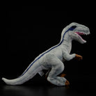 Realistic side profile of SoftDaysLab® Velociraptor plush with vibrant blue-striped detailing and fierce teeth