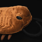 Side close-up of a Realistic Redlichiida Trilobite Plush, featuring embroidered eyes and prehistoric-inspired design